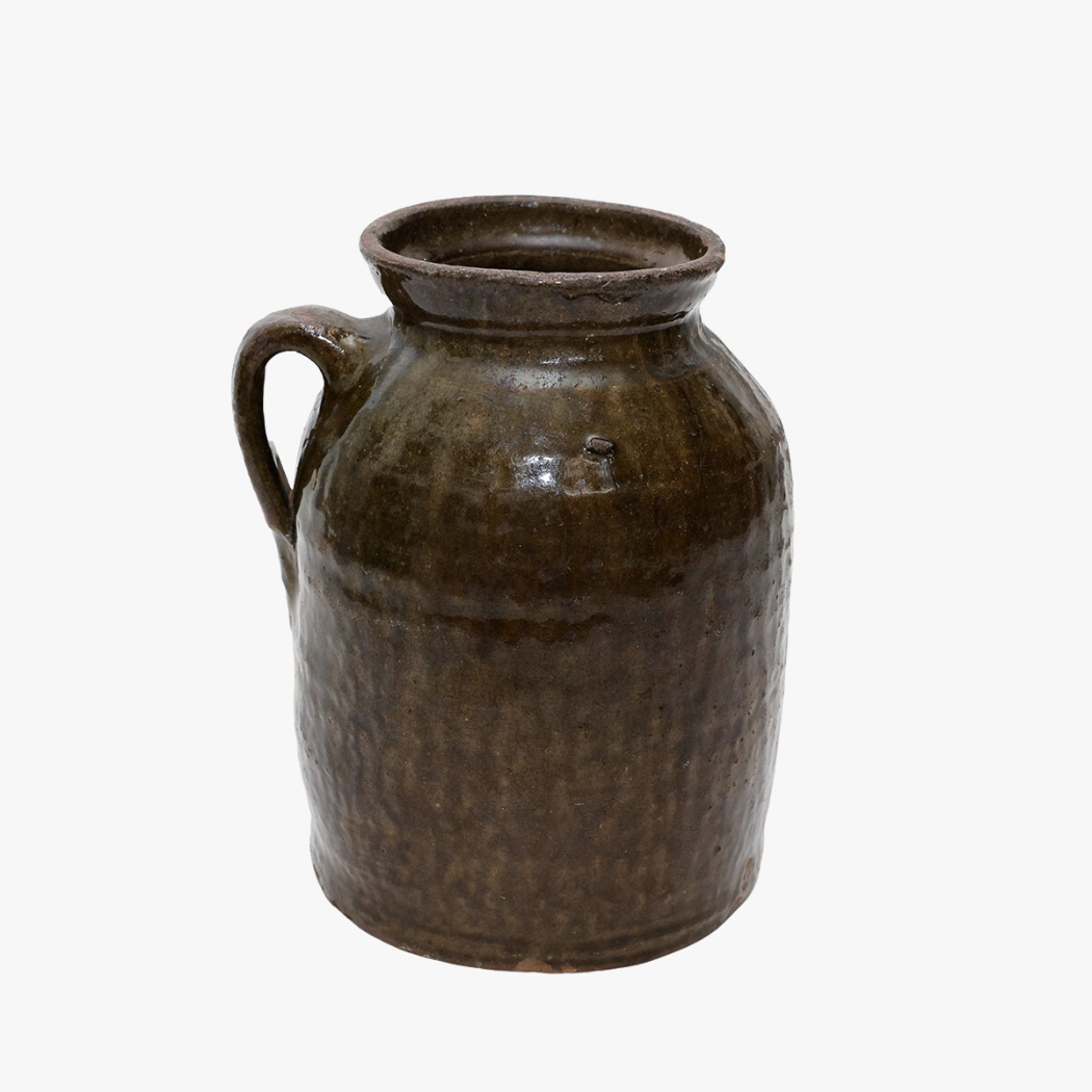 antique dark olive green crock/jug with handle